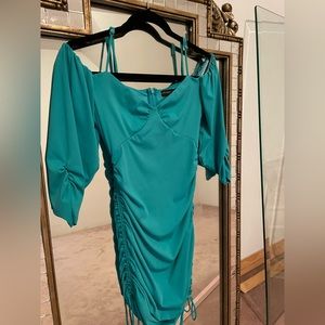 Super cute turquoise mini dress